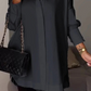 Elegante Oversize-Hemdbluse mit Rollärmeln