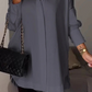 Elegante Oversize-Hemdbluse mit Rollärmeln