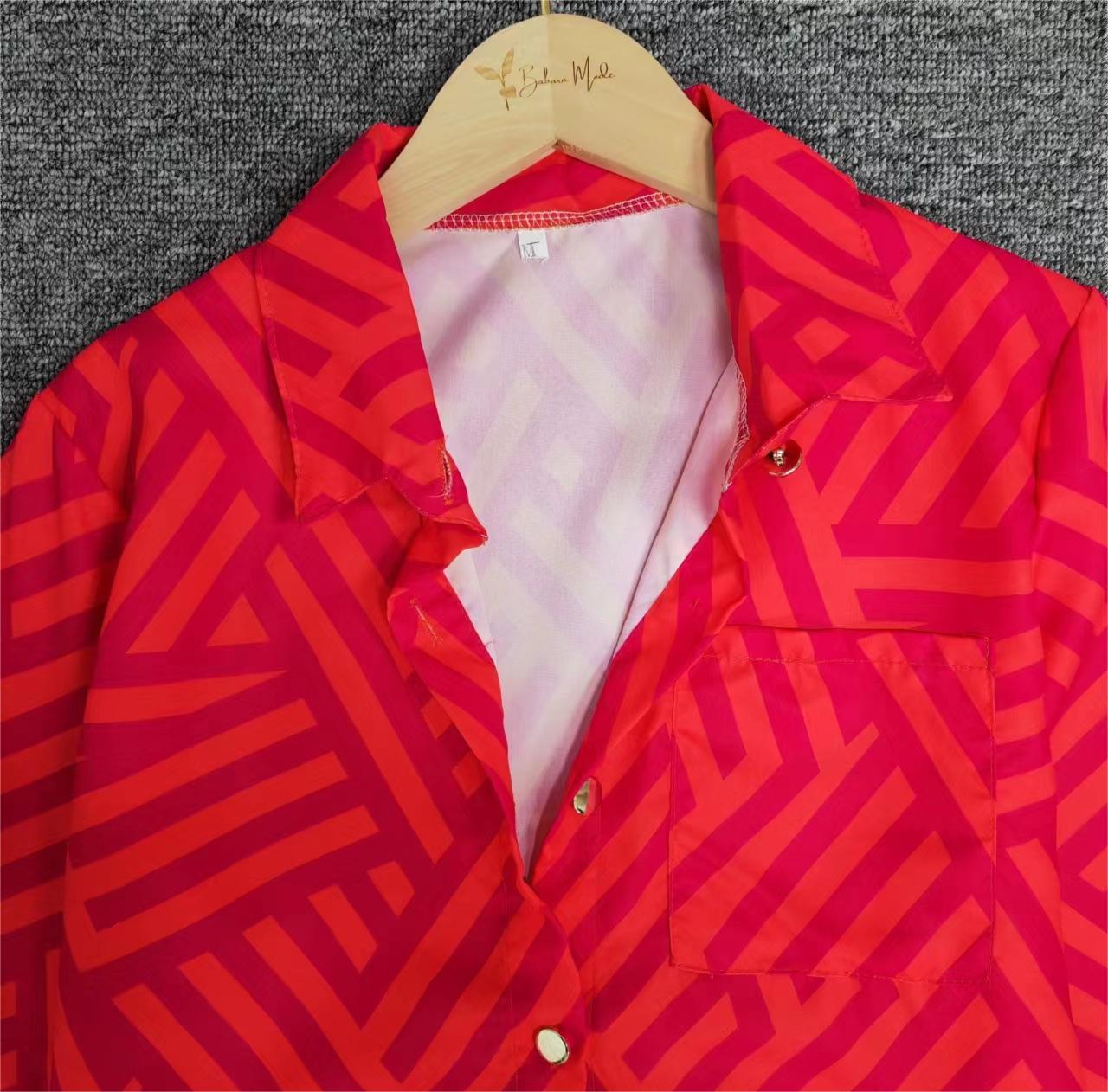 FallStil® - Rosa und orangefarbene Bluse mit Zick-Zack-Streifen und Knopfleiste