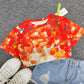 SpringStil® - Orangefarbenes Top mit Rundhalsausschnitt