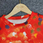 SpringStil® - Orangefarbenes Top mit Rundhalsausschnitt