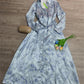 BlütenBliss® - Elegantes Maxikleid mit blauem Aufdruck