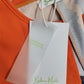 FallStil® - Orangefarbenes Midikleid mit halben Ärmeln und V-Ausschnitt
