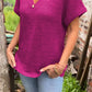 Stricktop mit Knopfdetail und V-Ausschnitt