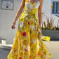 Maria – gelbes maxikleid mit spaghettiträgern und blumendruck