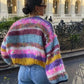 Emily – karierter cardigan mit regenbogenstreifen
