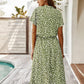 Schickes Midikleid mit Tupfenmuster und Taillenband
