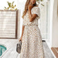 Schickes Midikleid mit Tupfenmuster und Taillenband
