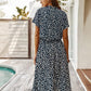 Schickes Midikleid mit Tupfenmuster und Taillenband