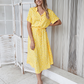 Schickes Midikleid mit Tupfenmuster und Taillenband