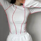 Geripptes Strahlen-Top - Roxanne