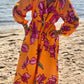 Celeste - Bedrucktes langärmeliges Maxikleid