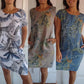 Eva - Weißes Midikleid mit Blättern