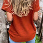 Stricktop mit Knopfdetail und V-Ausschnitt