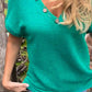 Stricktop mit Knopfdetail und V-Ausschnitt
