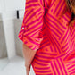 FallStil® - Rosa und orangefarbene Bluse mit Zick-Zack-Streifen und Knopfleiste